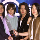 Members of Taiwan music group F4 (L-R) Ken Zhu, Vic Zhou, Jerry Yan and Vanness Wu hold souvenirs during a news conference in Hong Kong March 8, 2002. F4 will stay in town for five days to meet their fans. Their latest album "Meteor Rain" has achieved 1 million copies in countries throughout the Asia region.